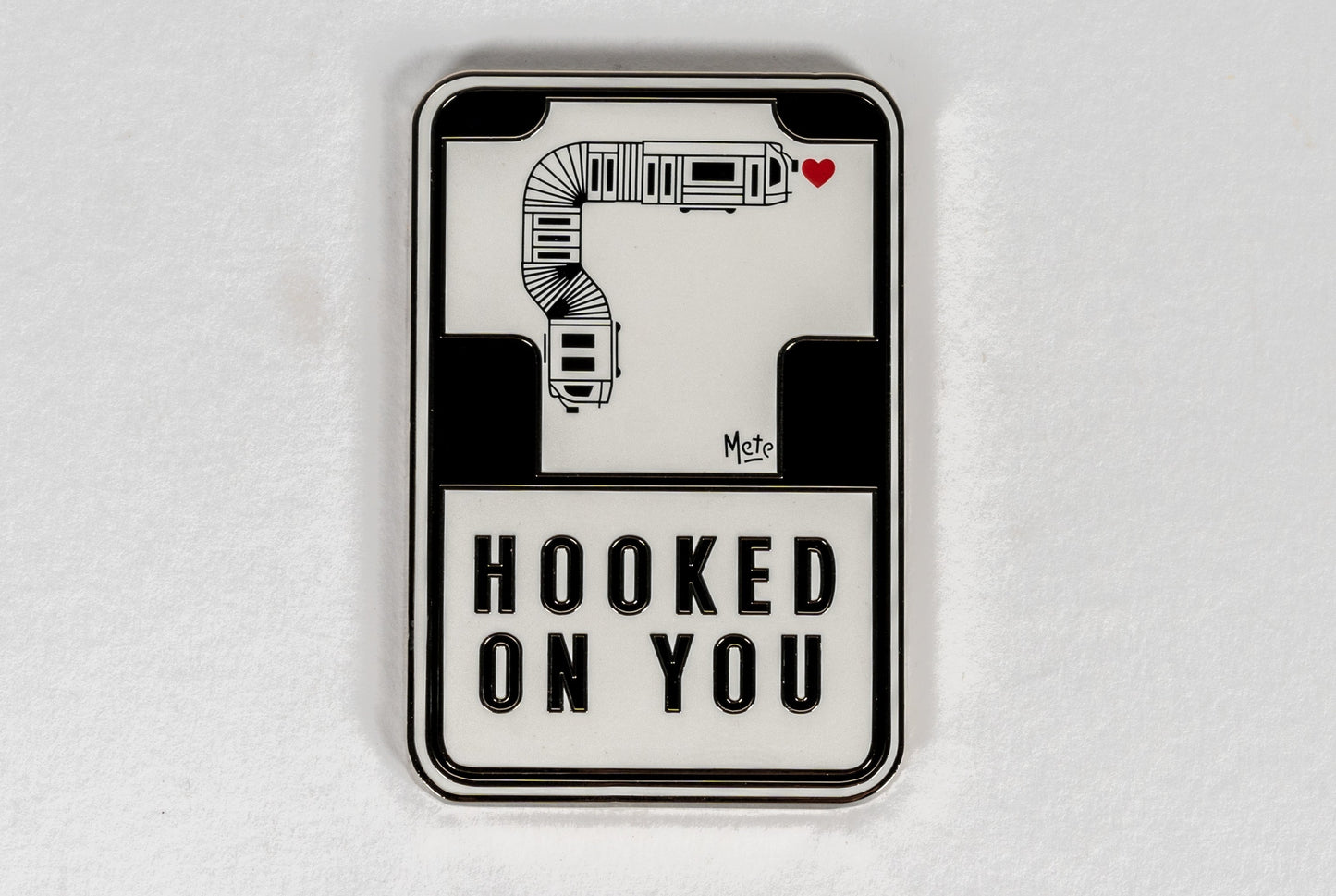 Close up of the enamel artwork of Melbourne Artist